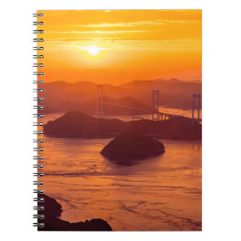 Hazy sunset on Kurushima Kaikyo Bridge and Kurushi Anteckningsbok