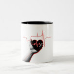 Heartbeat Love Design – Hand Holding Heart  Två-Tonad Mugg<br><div class="desc">Celebrate the beauty of life and love with this modern design featuring a hand holding a black heart outlined with a vibrant red heartbeat line. Perfect for nurses, doctors, medical students, or anyone who loves unique and symbolic art. Great gift idea for Valentine’s Day, healthcare workers, or anyone passionate about...</div>