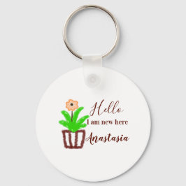 Hej jag är ny här, babyduschbarn blommigt löv p nyckelring
