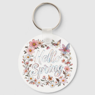 Hej vårblomma fjärilskrans med blomma nyckelring