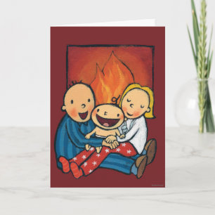 Helgdag Scene: Familj framför Fireplace Helgkort