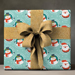 Helgdagar för vintervinter för Cute God jul Santa  Presentpapper<br><div class="desc">Cute God jul Santa Snögubbe Winter Helgdagars Mönster Gift Wrap Wrapping Papper har ett sött och vismiskt mönster med texten "God jul" i modern manustypografi accentuerad med en söt tomt på blå bakgrund. Perfekt för helgdag presentförpackning. Skapat av Evco Studio www.zazzle.com/store/evcostudio</div>