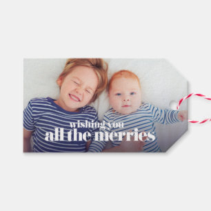 Helgdaggåvamärkre som *Wishing Merries* Presentetikett