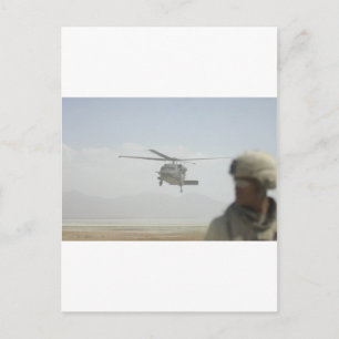 Helikopter samlar in trupper vykort