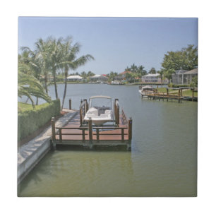 Hem och bryggor på kanal Marco Island Florida Kakelplatta