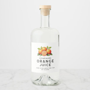 Hemlagad apelsinjuice med apelsiner och blad spritflaskor etikett