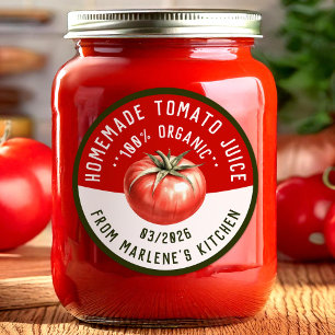 Hemlagad tomatjuice i två färger runt klistermärke