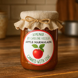 Hemlagd äppelmarmeladkonserveringsetikettblad runt klistermärke