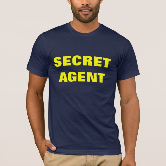 HEMLIG AGENTSKJORTA TEE SHIRT (Framsida)