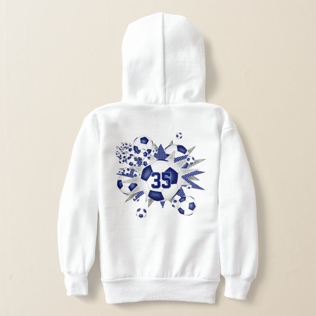 Hennes sportbullar är blå stjärnor. t shirt (Laydown Baksida)