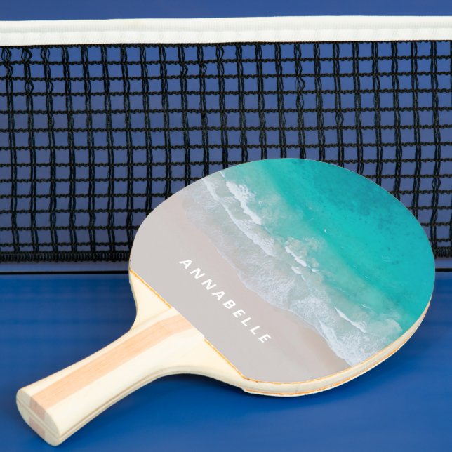 hett i tropiska sandstrand, modern pingisracket (Insitu)
