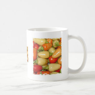 Hetten pepprar röd gult och orangen kaffemugg