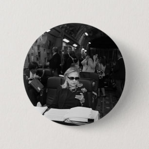 Hillary Clinton som är en chef Knapp