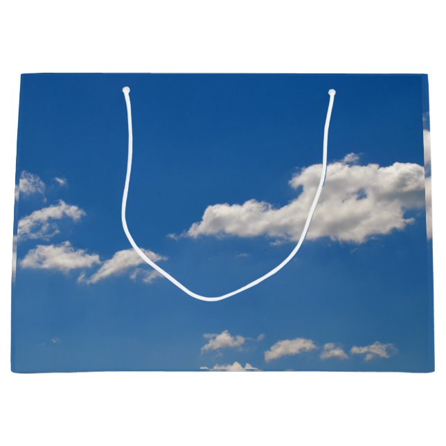 Himlar är blått och vita moln passerar förbi (Framsidan)