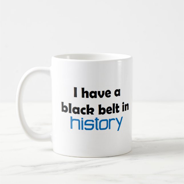Historia svart bälte kaffemugg (Vänster)