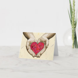 Hjärta i händervalentinkärlek helgkort