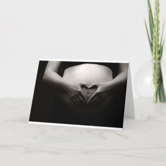 Hjärta på en gravid tumme kort