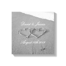 Hjärter i kanvastrycket med sandstrandfotografi