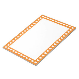 Hjärter runt anteckningsblock