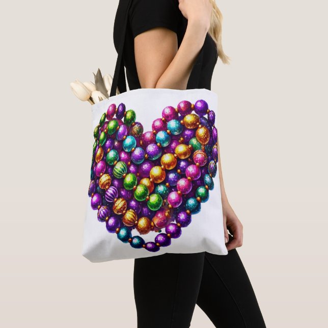 HJÄRTFORMADE MARDI GRAS PÄRLOR TYGKASSE (Närbild)