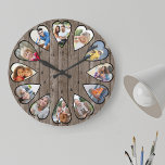 Hjärtformade Photos Rustic Mörk Wood Large Clock Stor Klocka<br><div class="desc">Skapa din egen multifotomilagning. Fotomallen har konfigurerats så att du kan lägga till 12 foton som visas i ett hjärtformade ram. Utformningen av porträtt-lodrät-foton för alla nummer utom 3 och 9 som är i liggande vågrät-format. Klockan ansikte har enkla nummer med en rustik mörk-träeffektbakgrund.</div>