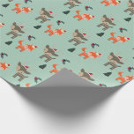 Hjort och räv i jultomten presentpapper<br><div class="desc">En söt och festlig omslutning papper med en roligt vismiskt mönster. En hjort och räv som bär julhattar. Likaledes tillför illustrationerna Holly och gräs träd lite helgdag vid jul i extra.</div>