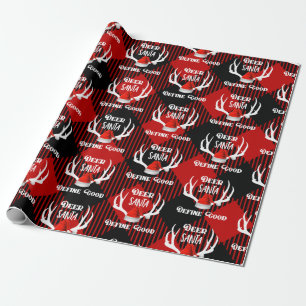 Hjort Santa definierar bra jul som jagar horn på Presentpapper