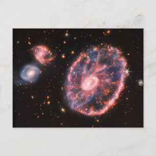 Hjulet-galaxen och dess följeslagare-galaxer. vykort