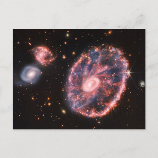 Hjulet-galaxen och dess följeslagare-galaxer. vykort (Framsida)