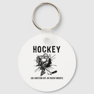 Hockey som brottning men på frusen betong Roligt Nyckelring