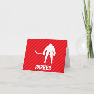 Hockeyspelare; scharlakansröda ränder kort