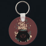 Hocus Pocus... Jag lägger en spell på er Cauldron Nyckelring<br><div class="desc">Dra upp en magisk olycka med den här fantastiska Hocus Pocus-inspirerade designen med en bubblningskauldron omgiven av mystiska örter, svampande svampar och snurrande stavverk! Den djärva, vintage-stil-texten "Jag lägger en stavning på dig" kommer från bryggan och fångar kärnan i Sanderson Sisters mest berömd-spellbindning. Perfekt för Halloween älskare och fläkt av...</div>