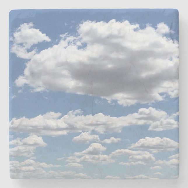 HÖGA KUMULÖRER OCH BLÅ HIMMEL STENUNDERLÄGG (Framsidan)