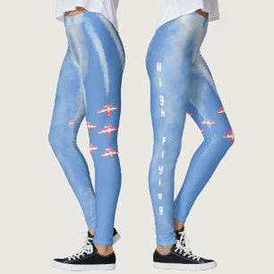 Högflygande akrobatiska flygplan på blå leggings