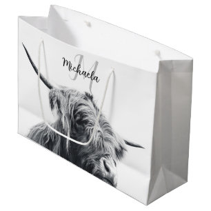 Höglandstko porträtt inledande monogram svart vitt