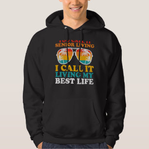 Högre leende äldre äldre pensionärer hoodie
