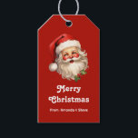 Holly Jolly Jultomten Retro jul Presentetikett<br><div class="desc">Ge märkre med en glatt illustration av en vintage stil Jultomten med röda rosyskskinn och bär hans klassiska rödtomhatt och stora vita björn. En snårskog bidrar till den festliga helgdag i denna utformning.</div>
