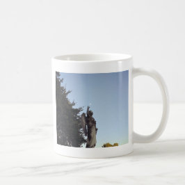 Hon är har måne i händer. kaffemugg