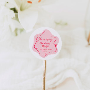 Hon knyter knuten retro vågig rosa röd runt klistermärke