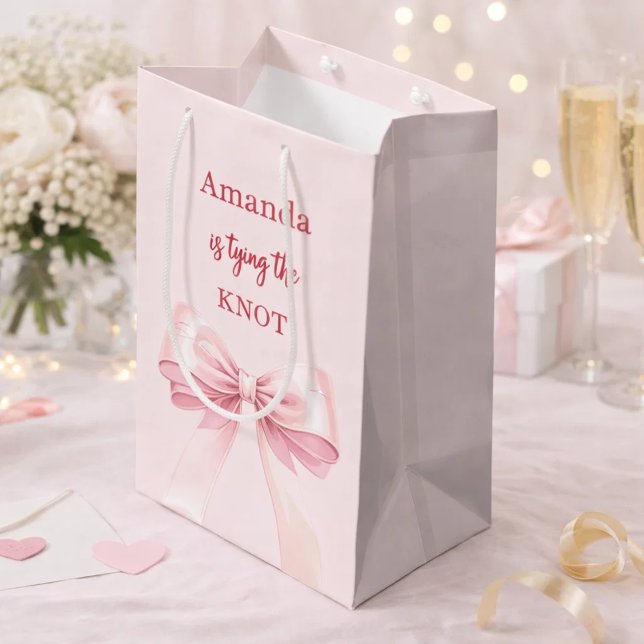 Hon knyter knuten rosa bröllopsfest (Skapare uppladdad)