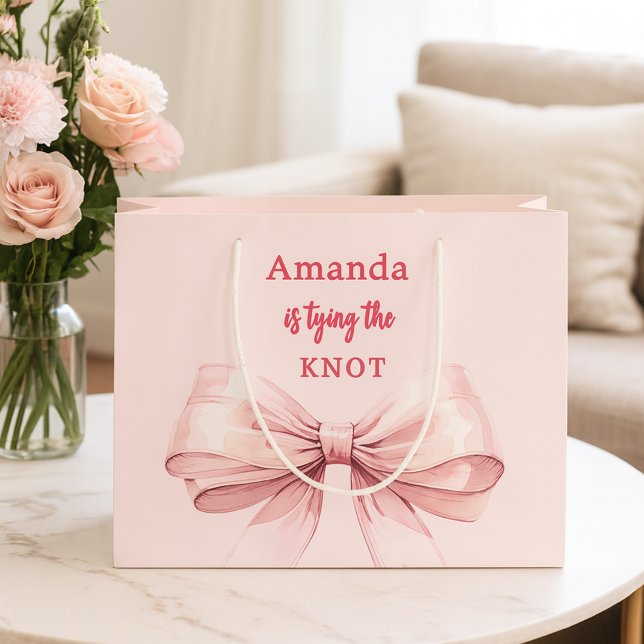 Hon knyter knuten rosa slinga Bröllopsfest (Skapare uppladdad)