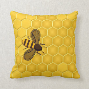 Honeybeen på en honungskakabrytning kudder kudde