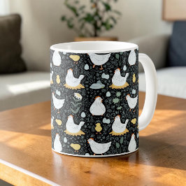 Hönor som drömmer i hönshuset i svart kaffemugg
