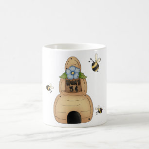 Honungsbin Hive med blå blommor och bin Kaffemugg