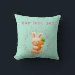 Hop Into Joy Kudde<br><div class="desc">Add festive charm to your home with the Hop Into Joy throw pillow! 🐰🥕✨ Featuring a cheerful bunny holding a carrot surrounded by pastel sparkles, this design brings playful Easter vibes to any space. Perfect for couches, nurseries, or seasonal décor, it combines cozy comfort with bright springtime style. Made with...</div>
