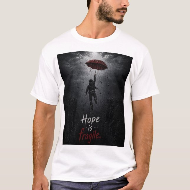 “Hope Is Fragile: Holding On While Everything Fall T Shirt (Framsida)