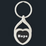 Hope Twisted Heart Silverfärgad Nyckelring<br><div class="desc">Schlüsselanhänger mit Namen Hope</div>