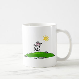 Hoppa för glädjeko på gräs kaffemugg