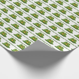 Hoppy födelsedaggroda som slår in papper presentpapper