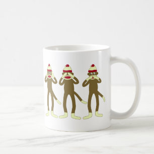 Hör, se, tala inga onda sock monkey kaffemugg